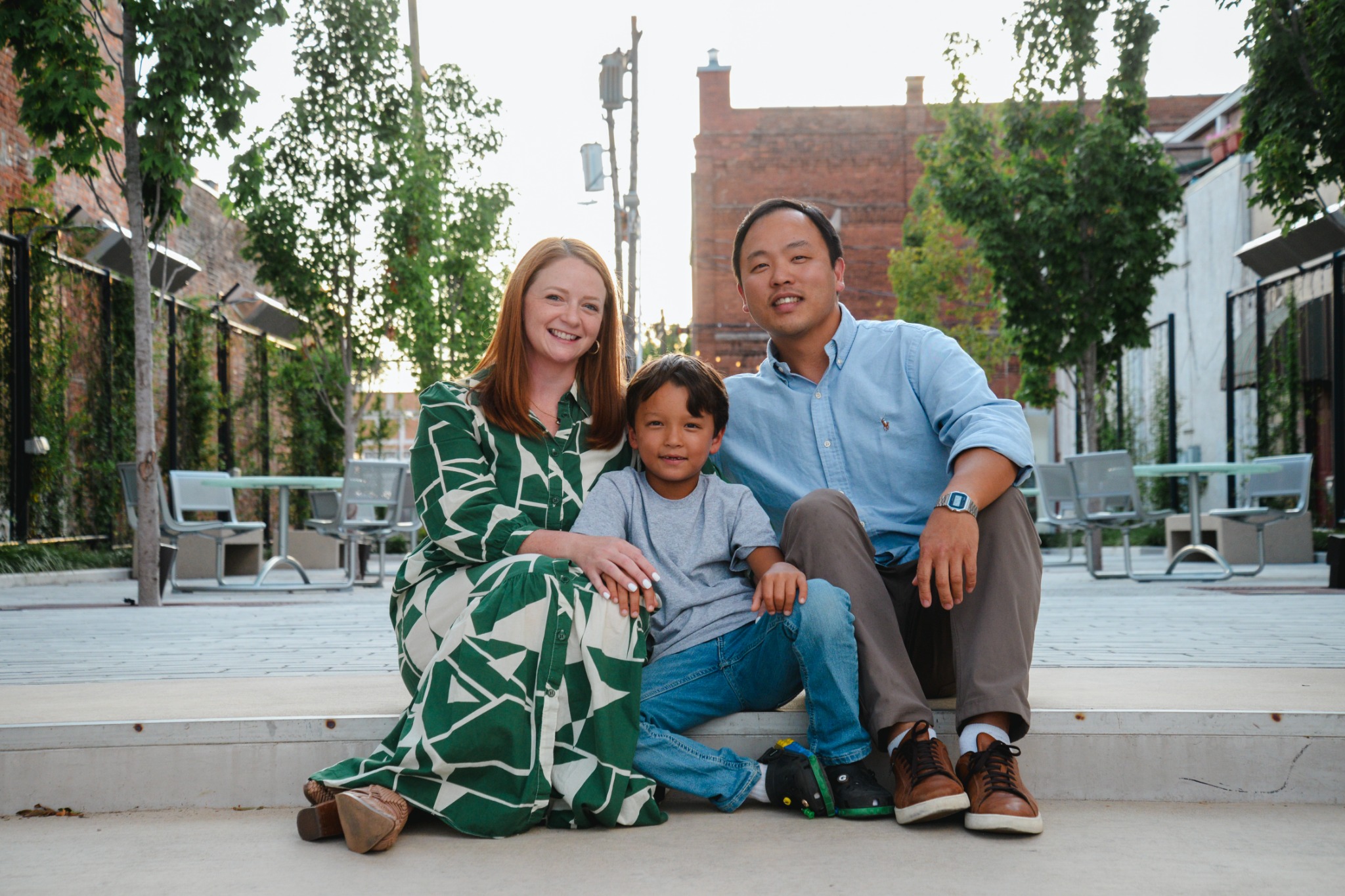 Mallory Sanders with her husband and son in Downtown Rogers